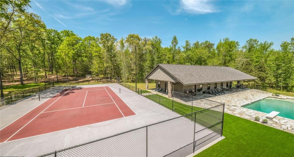 1600 Happy Hollow Road Roopville, GA 30170 - Photo 40 of 41 a house view with a backyard space