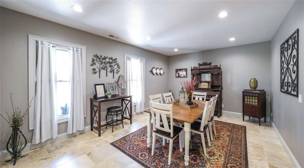 1600 Happy Hollow Road Roopville, GA 30170 - Photo 7 of 41 a dining room with furniture and window