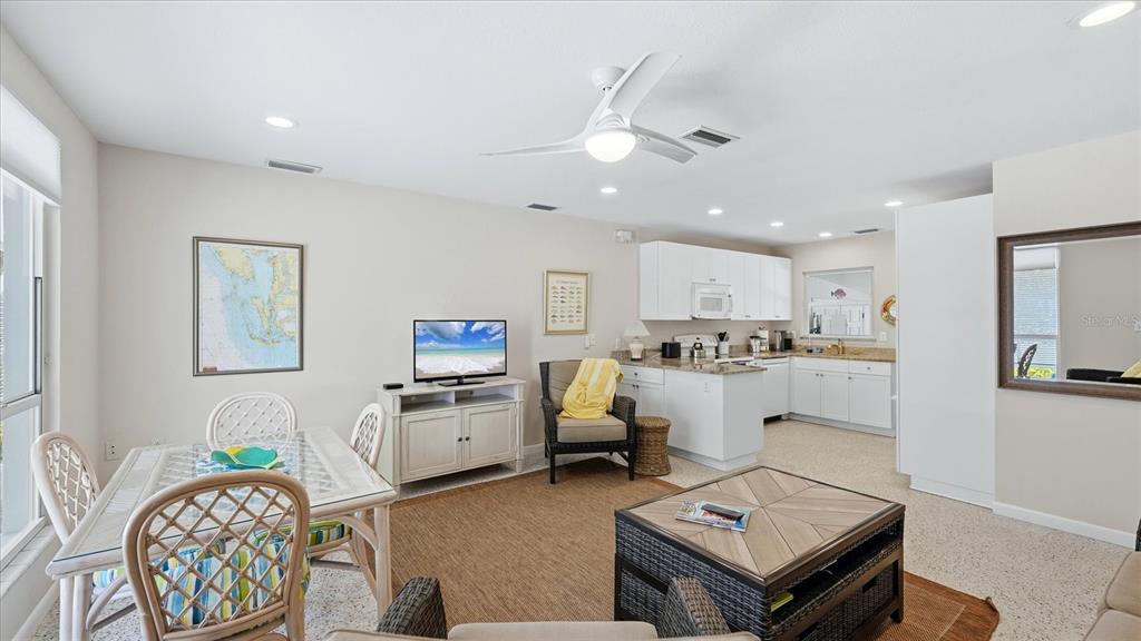 201 Wheeler Road Boca Grande, FL 33921 - Photo 11 of 26 a living room with furniture and kitchen view
