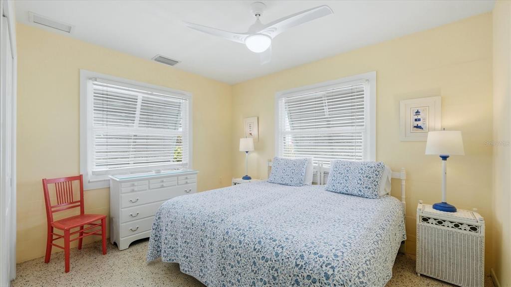 201 Wheeler Road Boca Grande, FL 33921 - Photo 14 of 26 a bedroom with a bed and furniture