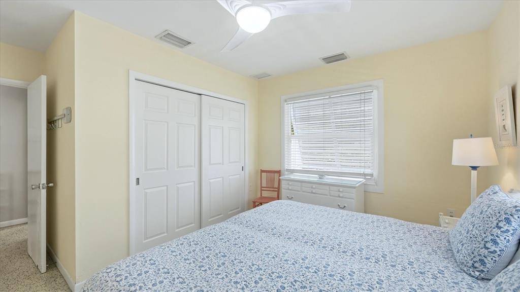201 Wheeler Road Boca Grande, FL 33921 - Photo 15 of 26 a bedroom with a bed and a closet