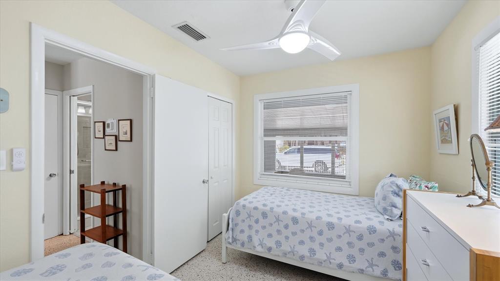 201 Wheeler Road Boca Grande, FL 33921 - Photo 17 of 26 a bedroom with a bed and a window