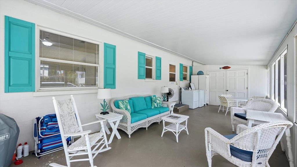 201 Wheeler Road Boca Grande, FL 33921 - Photo 20 of 26 a living room with furniture and a window