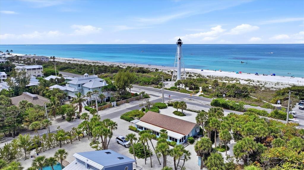 201 Wheeler Road Boca Grande, FL 33921 - Photo 3 of 26 an aerial view of a house with a garden