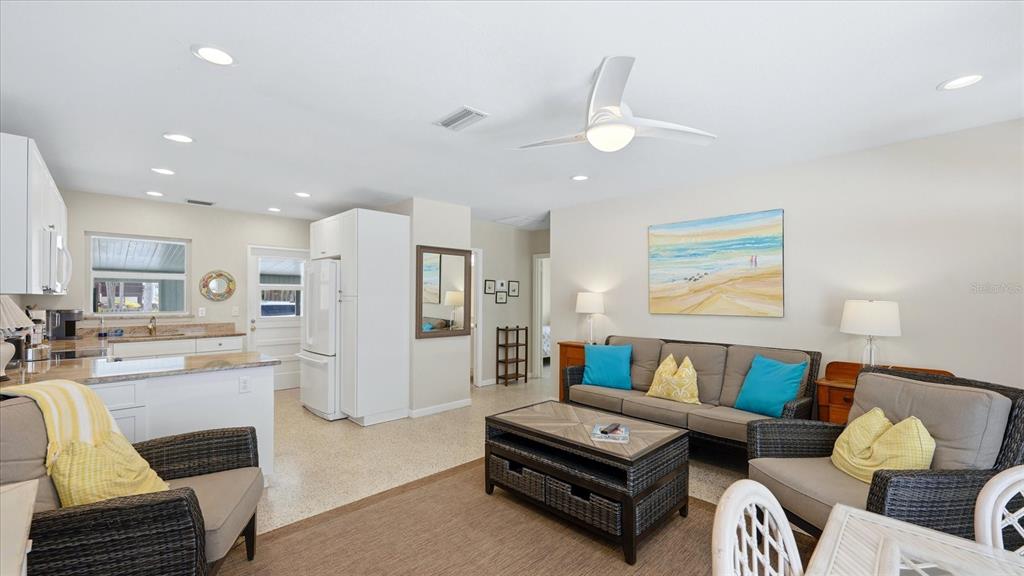 201 Wheeler Road Boca Grande, FL 33921 - Photo 8 of 26 a living room with furniture and kitchen view