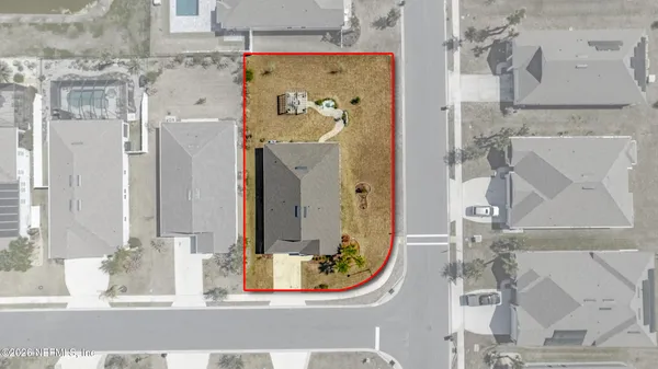 a front view of a house with outdoor seating