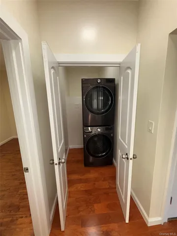 a view of utility room and empty room
