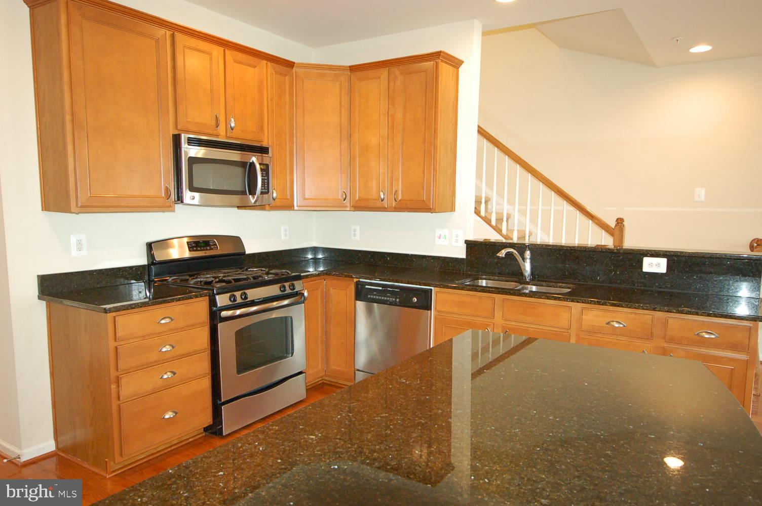 2717 Amber Crest Road Hanover, MD 21076 - Photo 14 of 50 Kitchen microwave exhaust to exterior