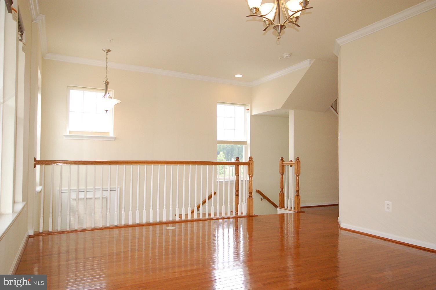 2717 Amber Crest Road Hanover, MD 21076 - Photo 3 of 50 Gleaming hardwood floor on the main level