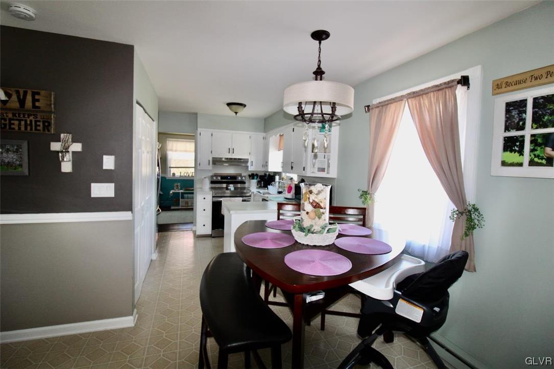 472 Georgetown Road Nazareth, PA 18064 - Photo 11 of 30 a view of a dining room with furniture window and wooden floor