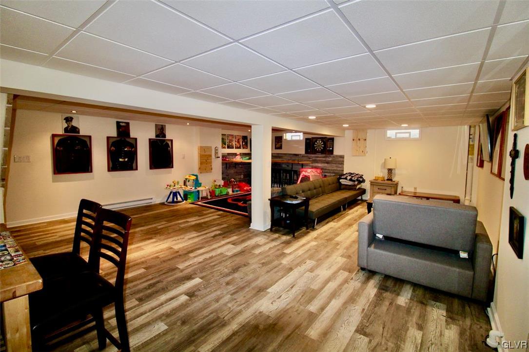 472 Georgetown Road Nazareth, PA 18064 - Photo 22 of 30 a living room with furniture and a flat screen tv