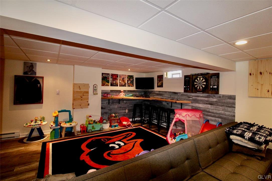 472 Georgetown Road Nazareth, PA 18064 - Photo 24 of 30 a living room with furniture and a flat screen tv