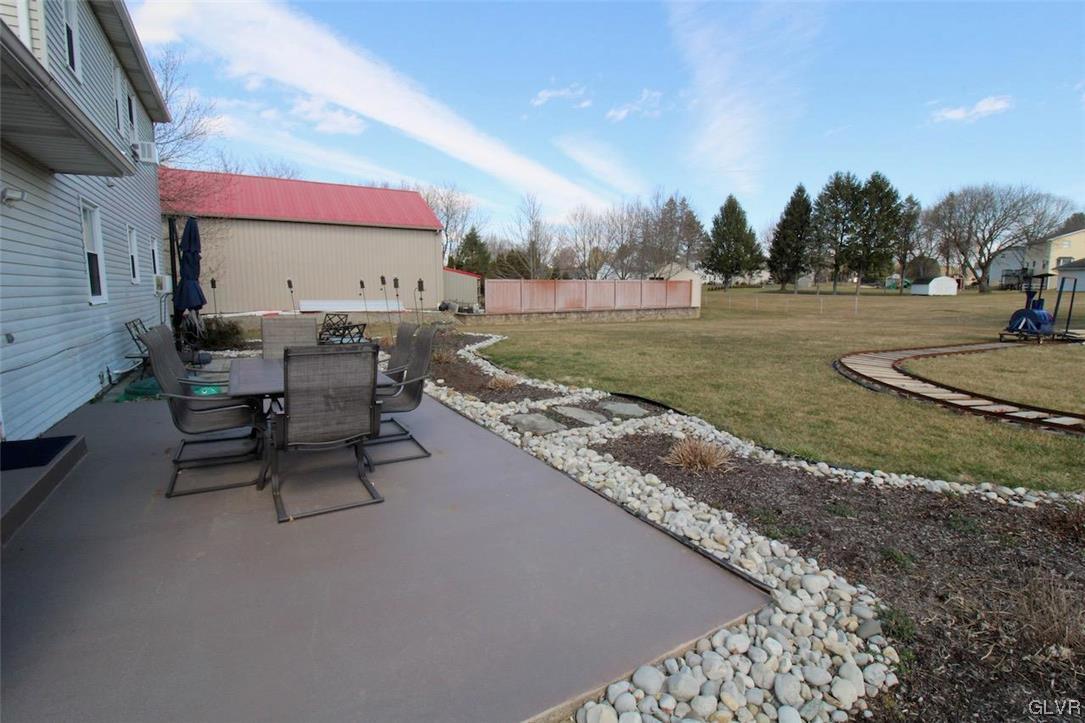 472 Georgetown Road Nazareth, PA 18064 - Photo 27 of 30 a view of a house with backyard porch and sitting area
