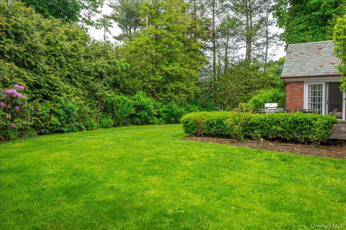 7 Harcourt Road Scarsdale, NY 10583 - Photo 30 of 34 a view of backyard of house with green space