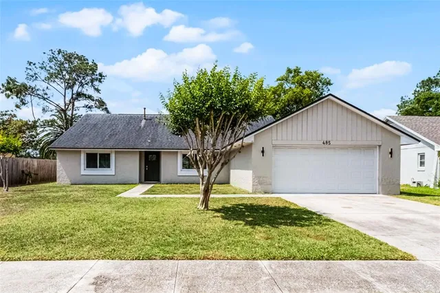 a house view with a garden space