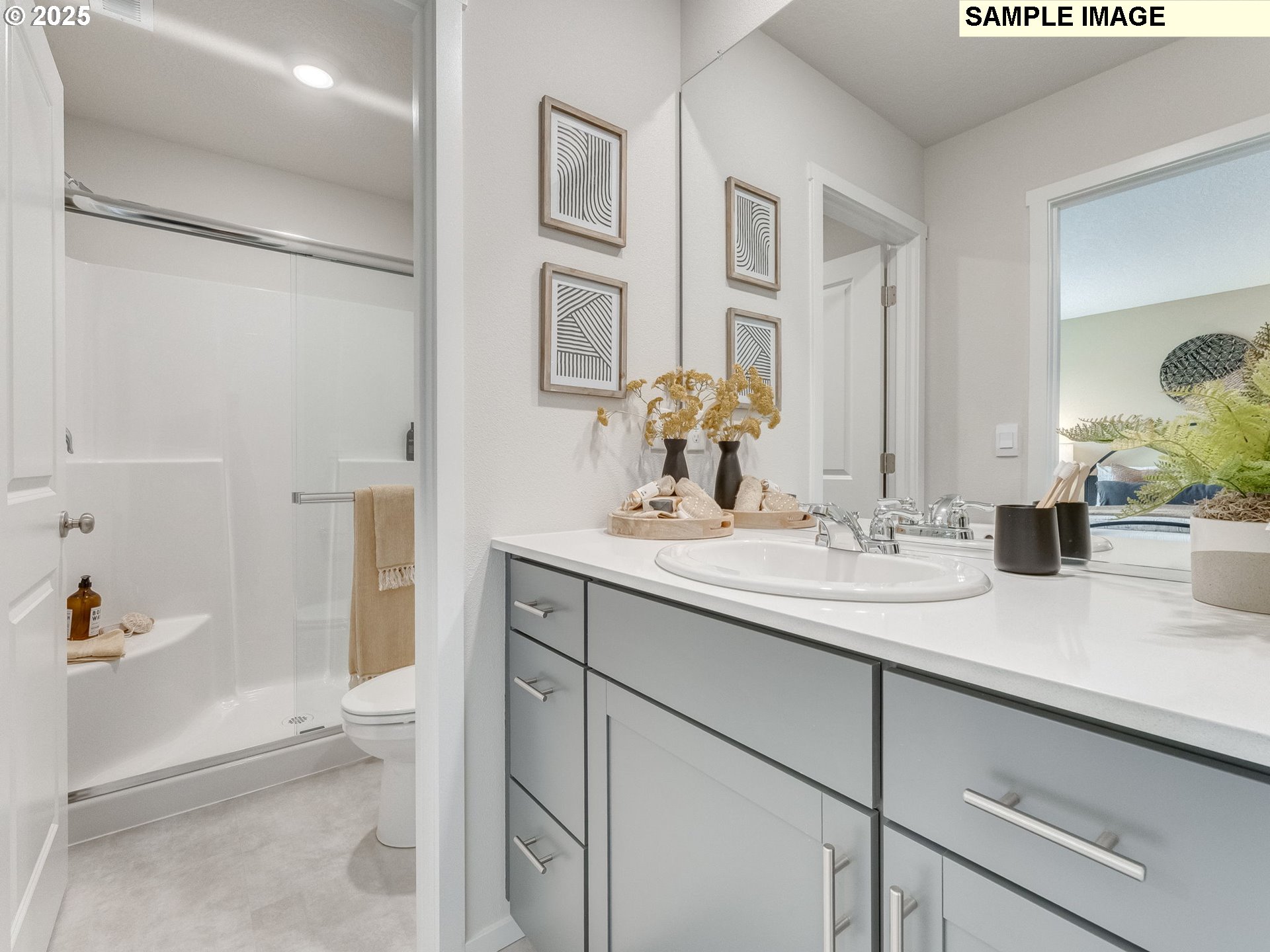 1107 Southeast 193rd Place Camas, WA 98607 - Photo 26 of 31 a bathroom with a granite countertop sink and a mirror