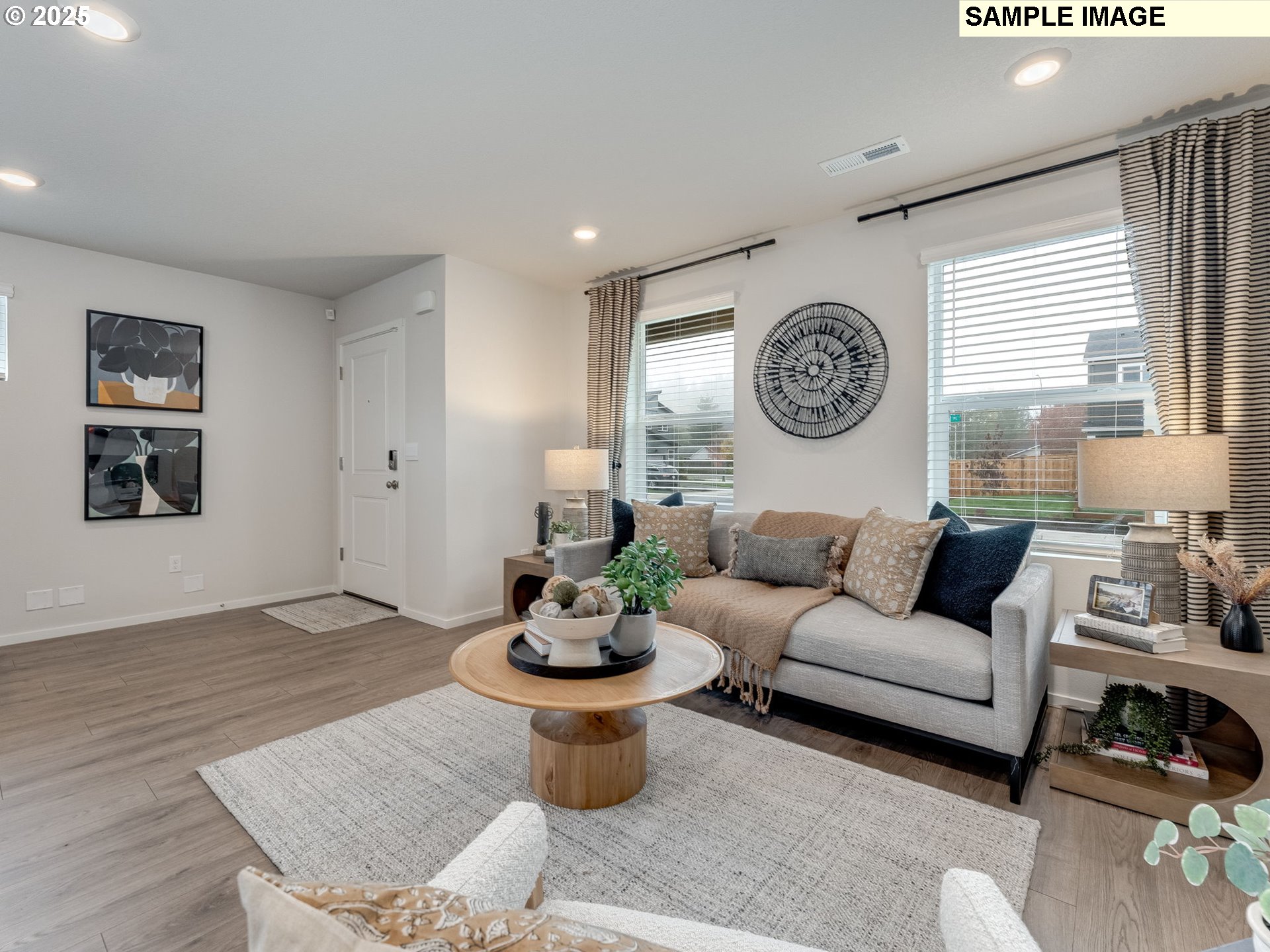 1107 Southeast 193rd Place Camas, WA 98607 - Photo 3 of 31 a living room with furniture a window and a table