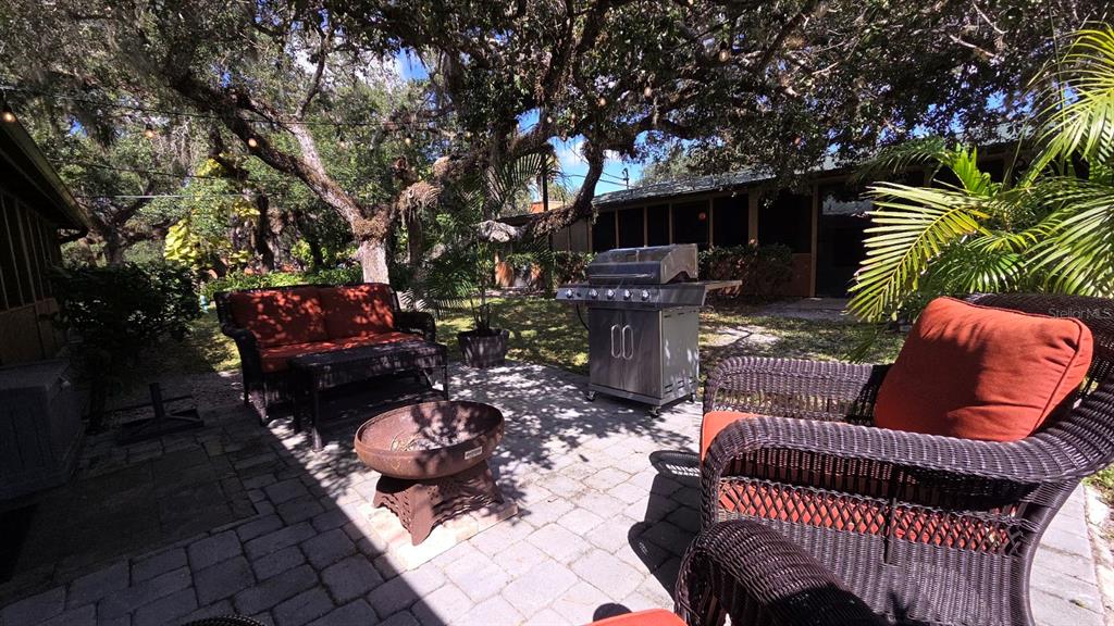 3200 River Ranch Boulevard, Unit 303 River Ranch, FL 33867 - Photo 16 of 16 a outdoor living space with patio furniture