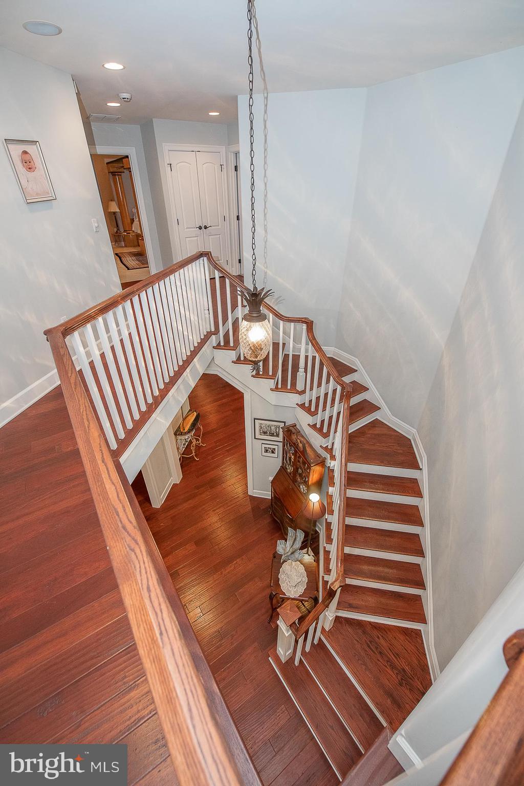 317 Conestoga Road Wayne, PA 19087 - Photo 37 of 65 Curved stairway as seen from second floor