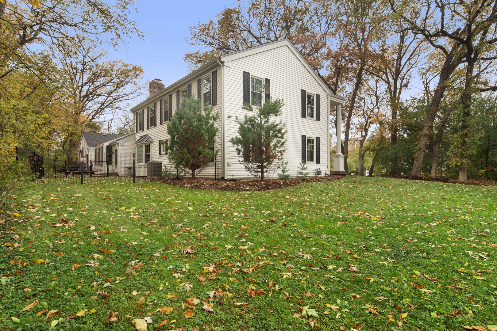 21361 West Brandon Road Kildeer, IL 60047 - Photo 30 of 30 a view of a white house with a big yard and large trees