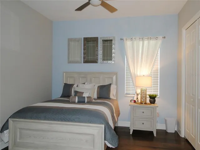 an aerial view of a house with a swimming pool