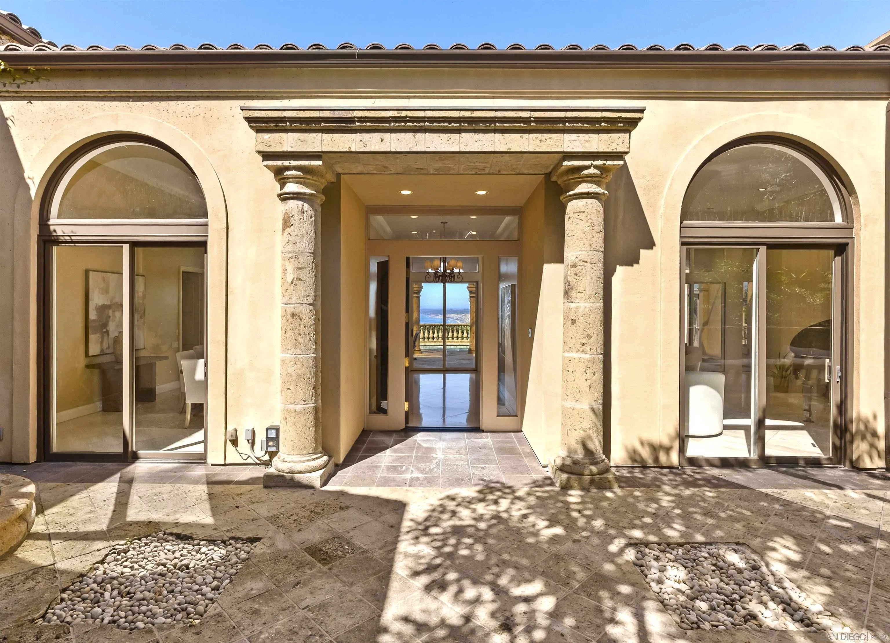 2302 Rue Adriane La Jolla, CA 92037 - Photo 5 of 31 a view of a brick house with outdoor space