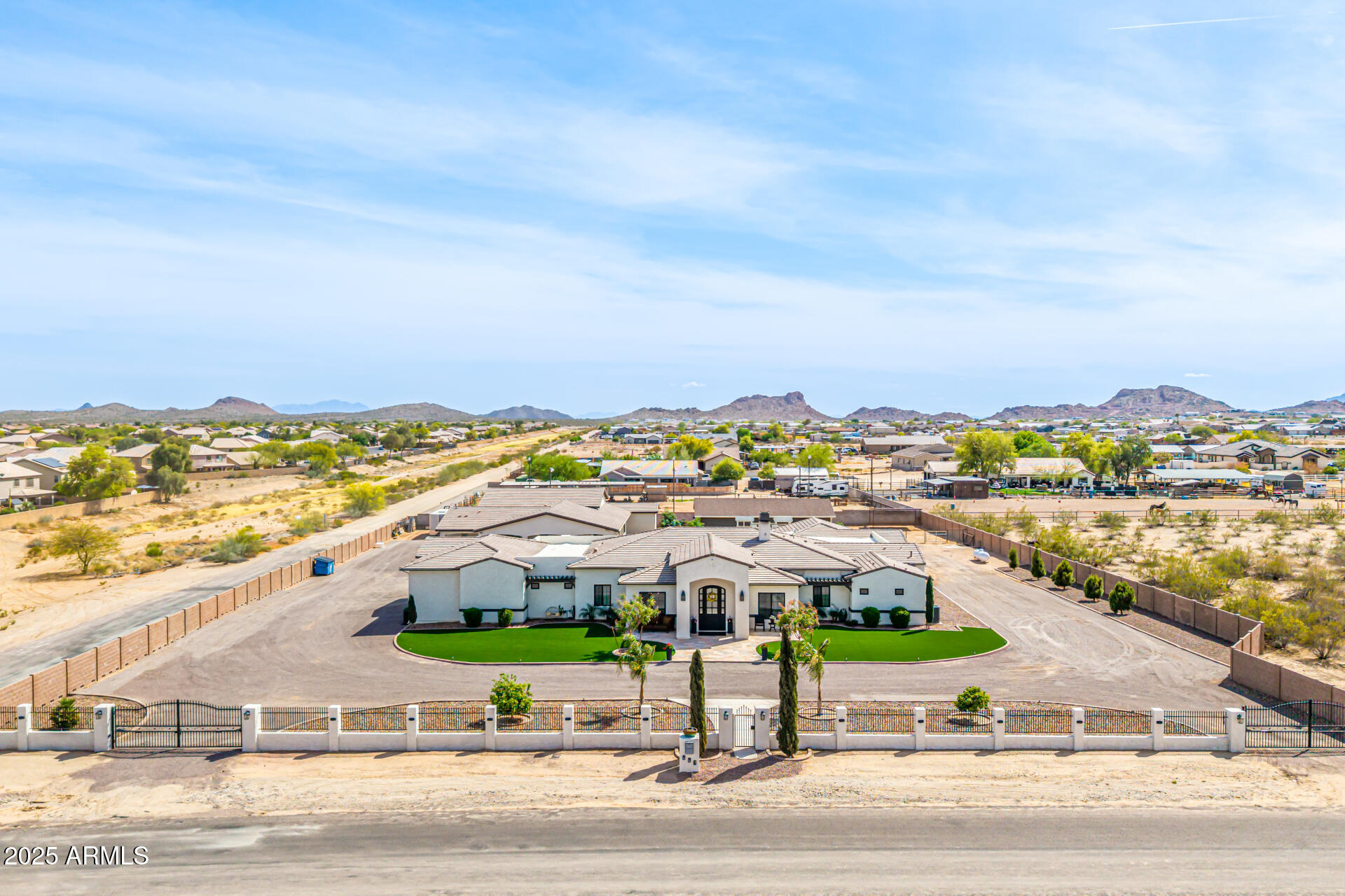 an aerial view of residential building and ocean view