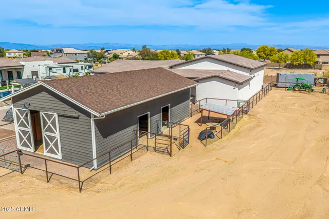 a bedroom with a bed and a mirror