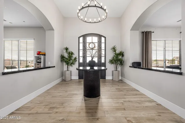 a bathroom with a bathtub a sink and a window
