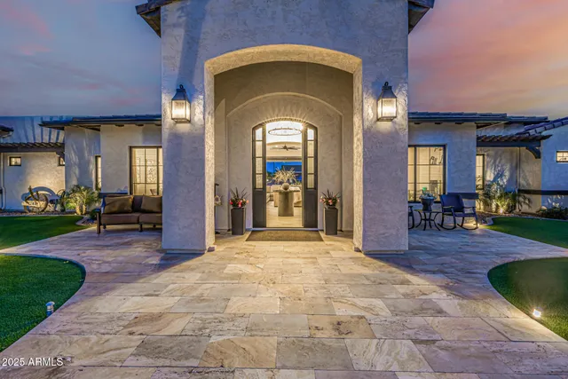 a bath tub sitting in a bathroom next to a window