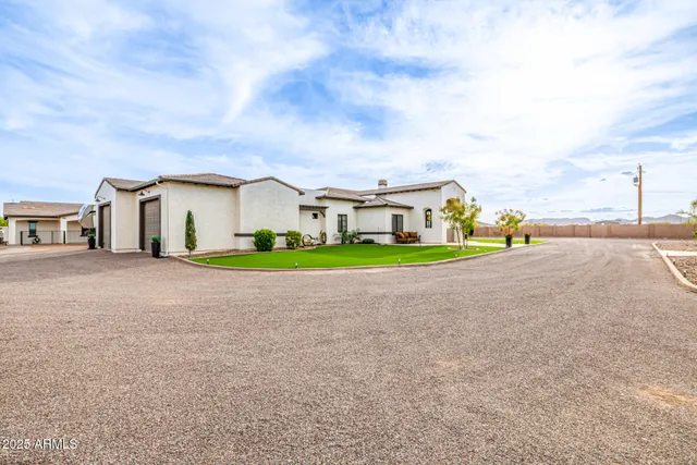 a open kitchen with kitchen island a stove sink and refrigerator