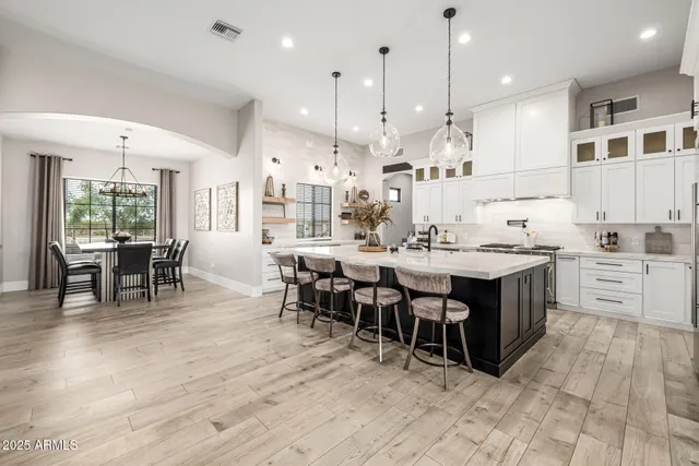 a view of a gym room with gym equipment