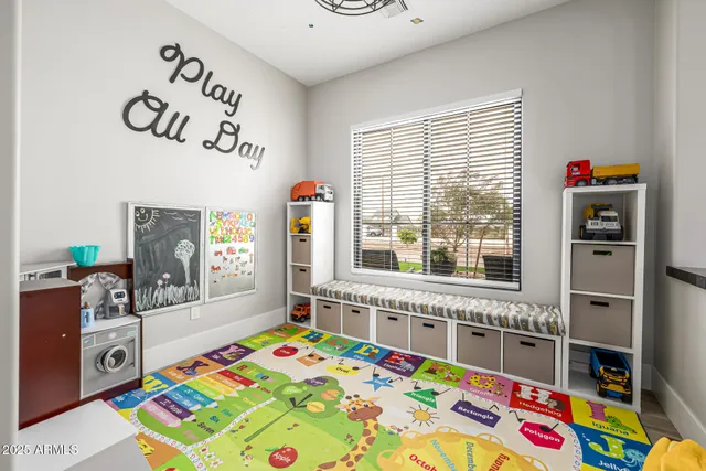 a kitchen with stainless steel appliances granite countertop a stove a sink dishwasher and cabinets with wooden floor