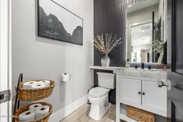 an aerial view of a house with a ocean view