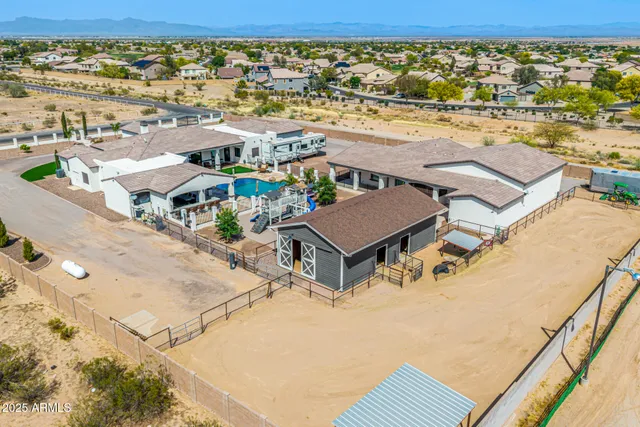 a stove top oven sitting inside of a kitchen