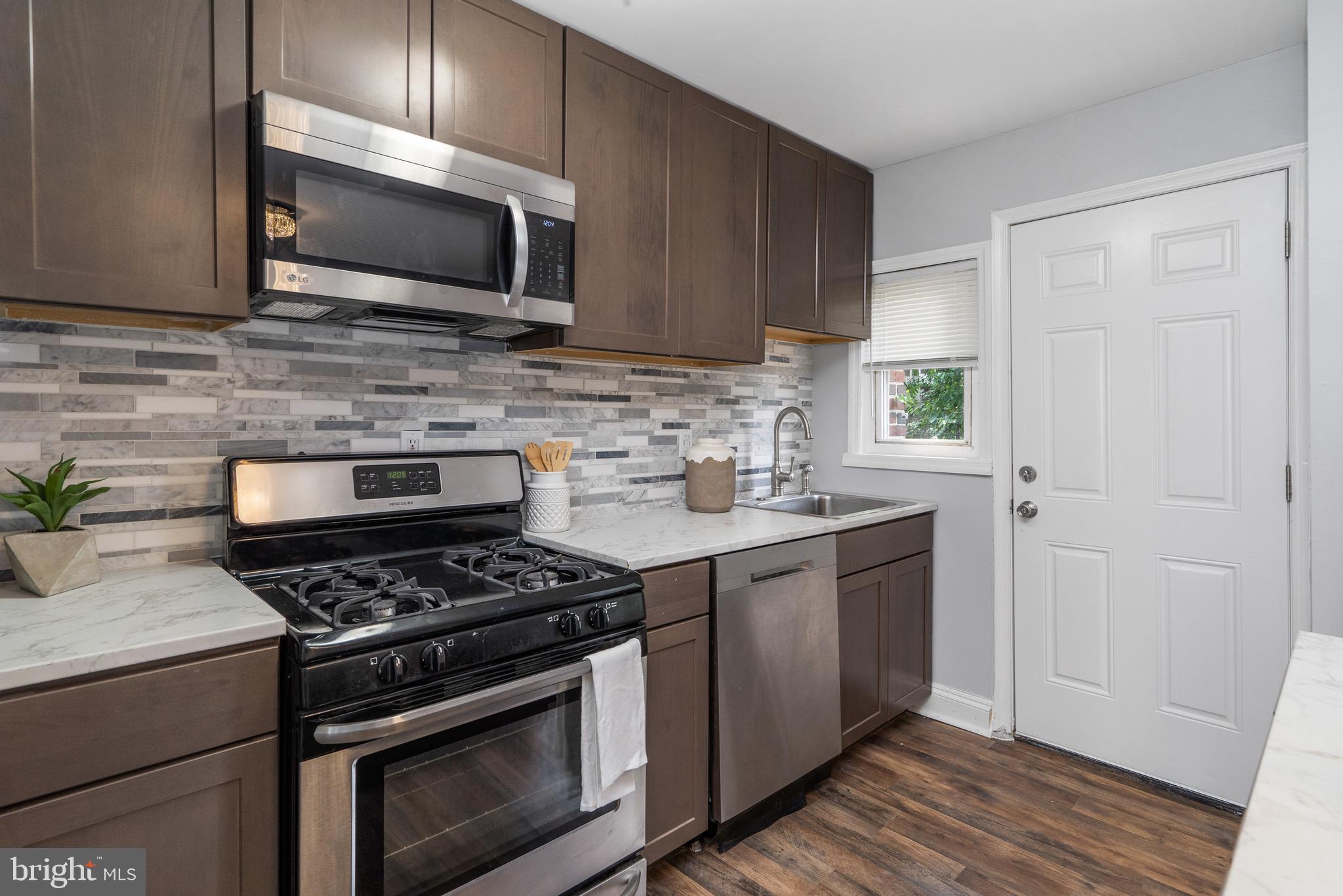 4415 Pen Lucy Road Baltimore, MD 21229 - Photo 8 of 27 Kitchen with stainless steel appliances