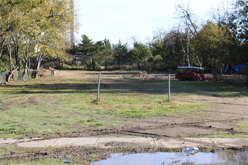 4118 Easter Avenue Dallas, TX 75216 - Photo 2 of 5 a view of a yard with large trees