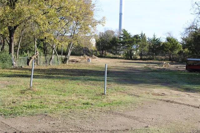 a view of backyard with green space