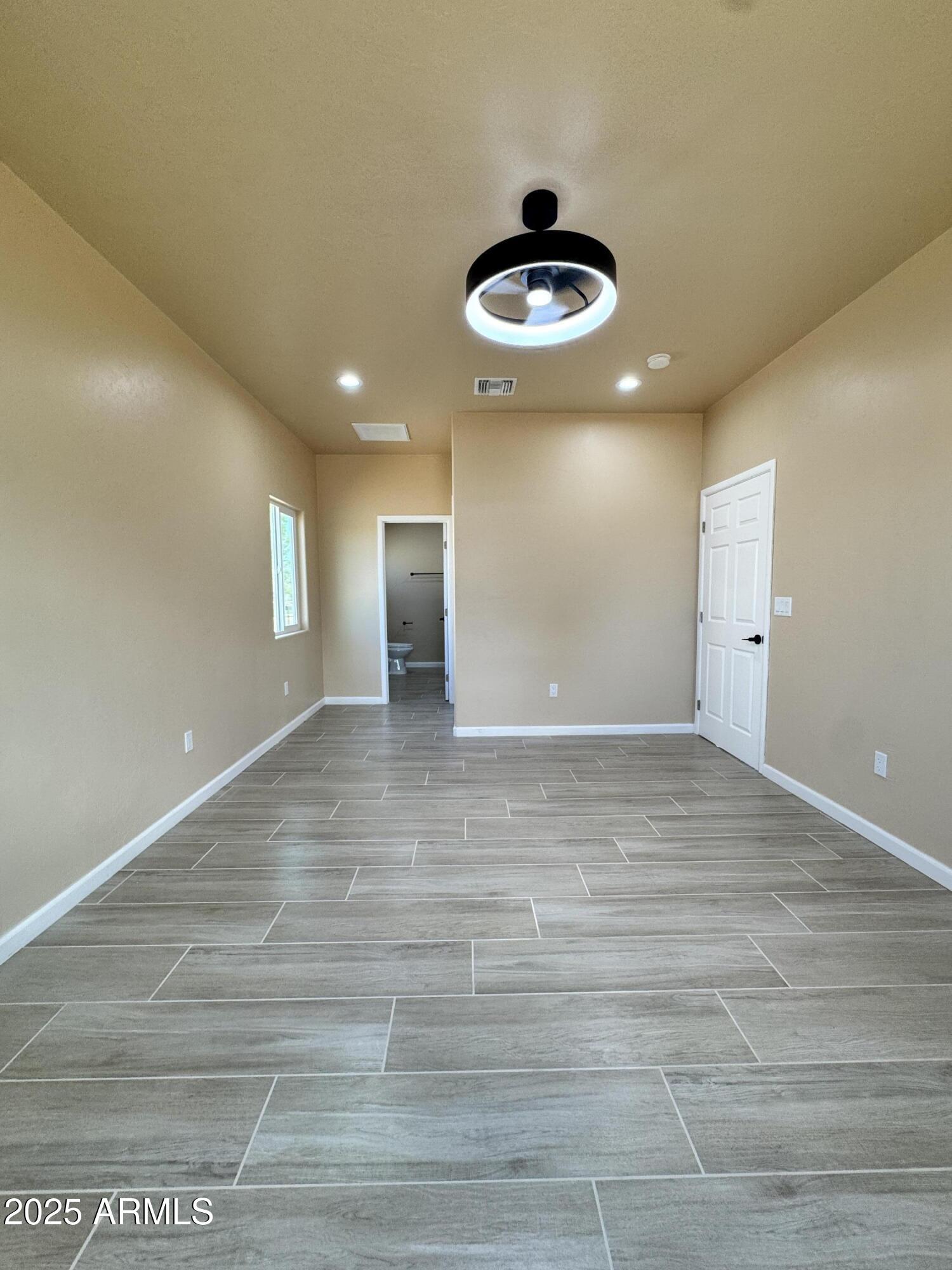 1457 East 23rd Street Douglas, AZ 85607 - Photo 15 of 23 a view of an empty room and a window