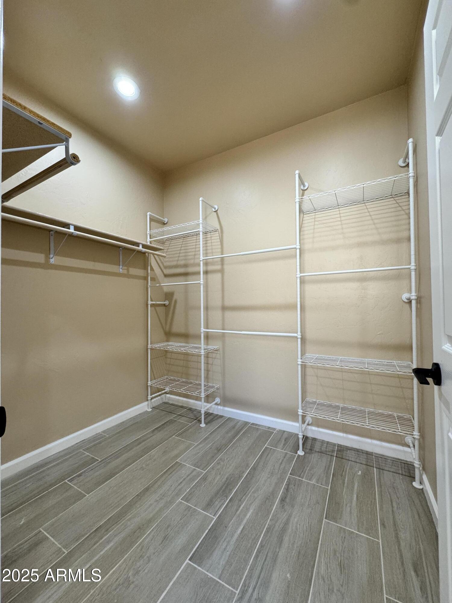 1457 East 23rd Street Douglas, AZ 85607 - Photo 16 of 23 an empty room with wooden floor