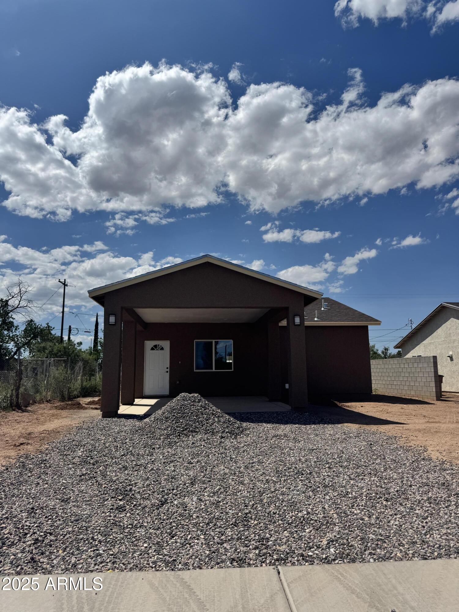 1457 East 23rd Street Douglas, AZ 85607 - Photo 23 of 23 a front view of a house with a yard