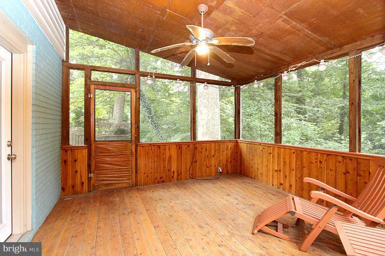 6606 Rannoch Court Bethesda, MD 20817 - Photo 21 of 24 Screened Porch in Wooded Back Garden
