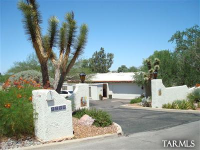 9985 North Desert Sky Road Oro Valley, AZ 85737 - Photo 1 of 43 a view of a house with a tree s