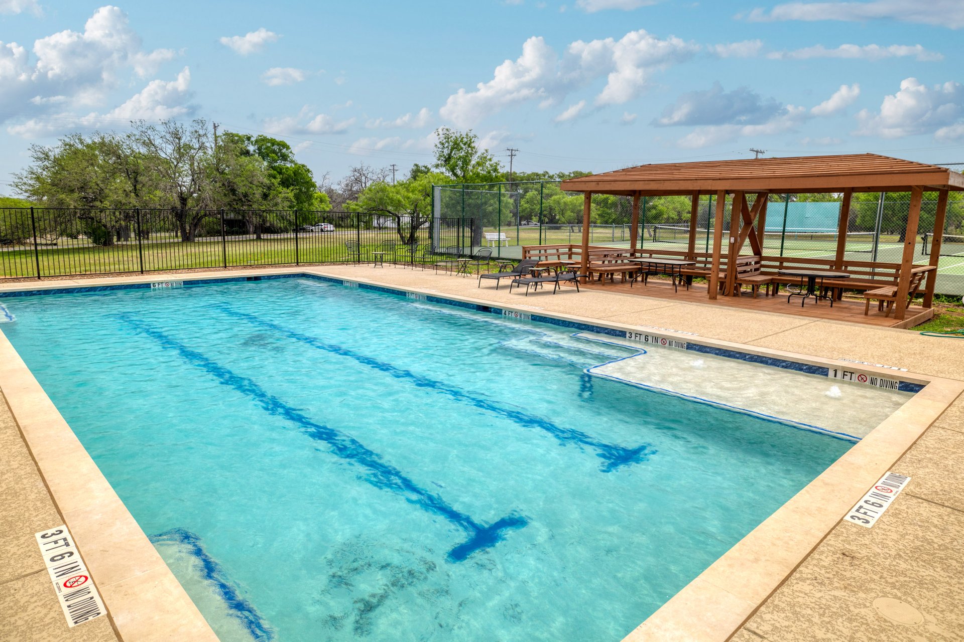 313 Kendall Road Spicewood, TX 78669 - Photo 30 of 34 Community pool with a patio area