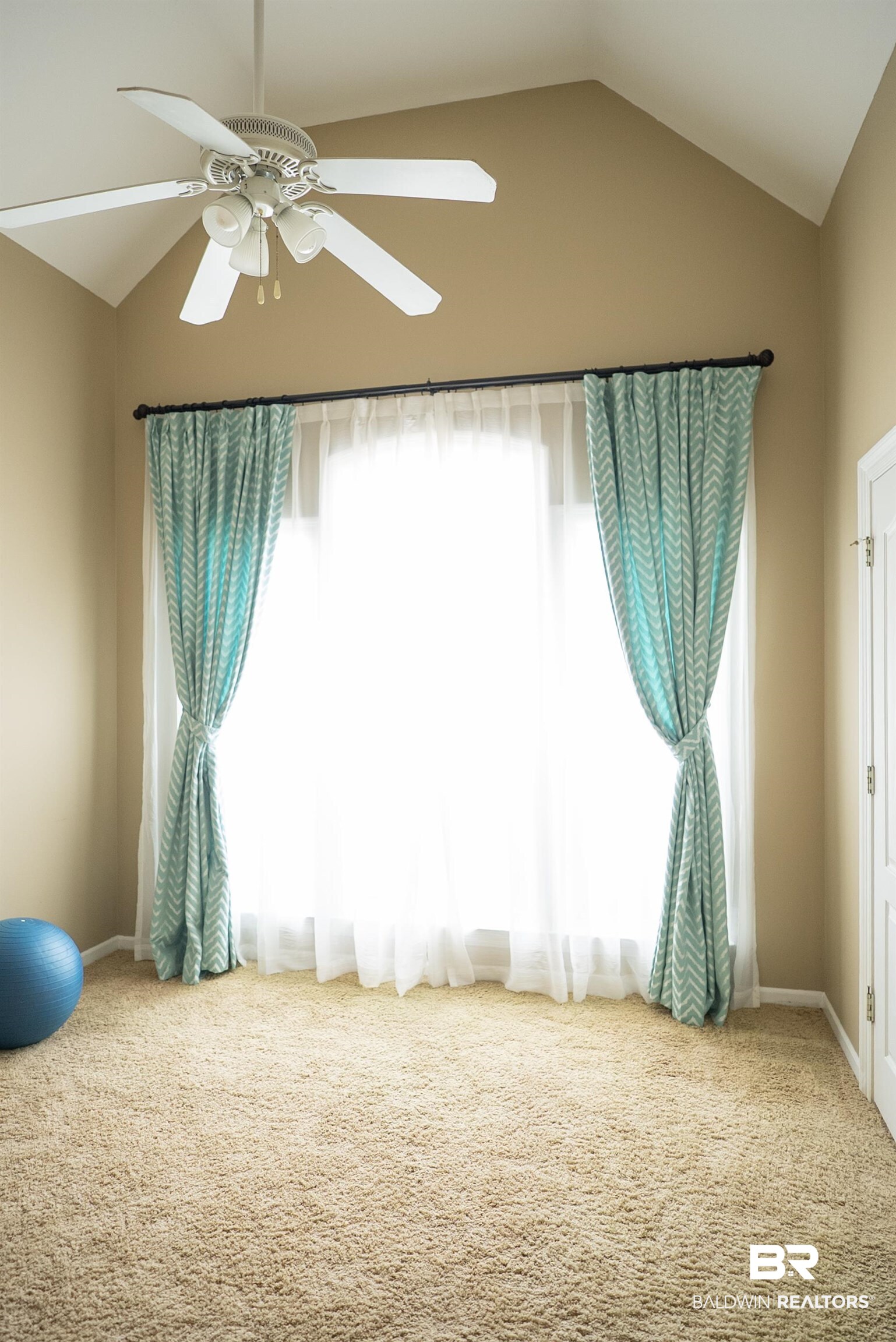 10023 Springfield Court Mobile, AL 36695 - Photo 22 of 50 Carpeted spare room featuring lofted ceiling