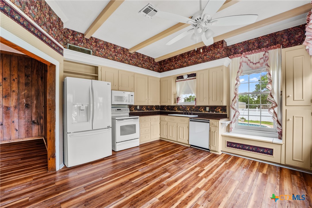 2967 South Old Robinson Road Lorena, TX 76655 - Photo 13 of 41 a kitchen with granite countertop white cabinets and white appliances