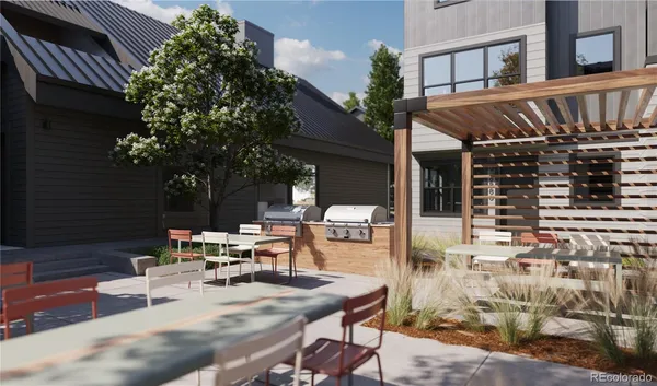a view of a patio with a table and chairs in patio