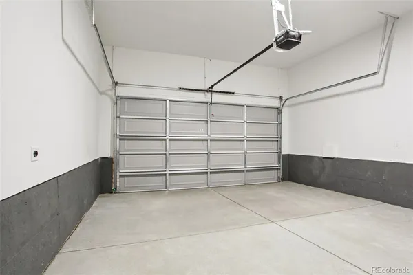 a view of an empty room with shelves