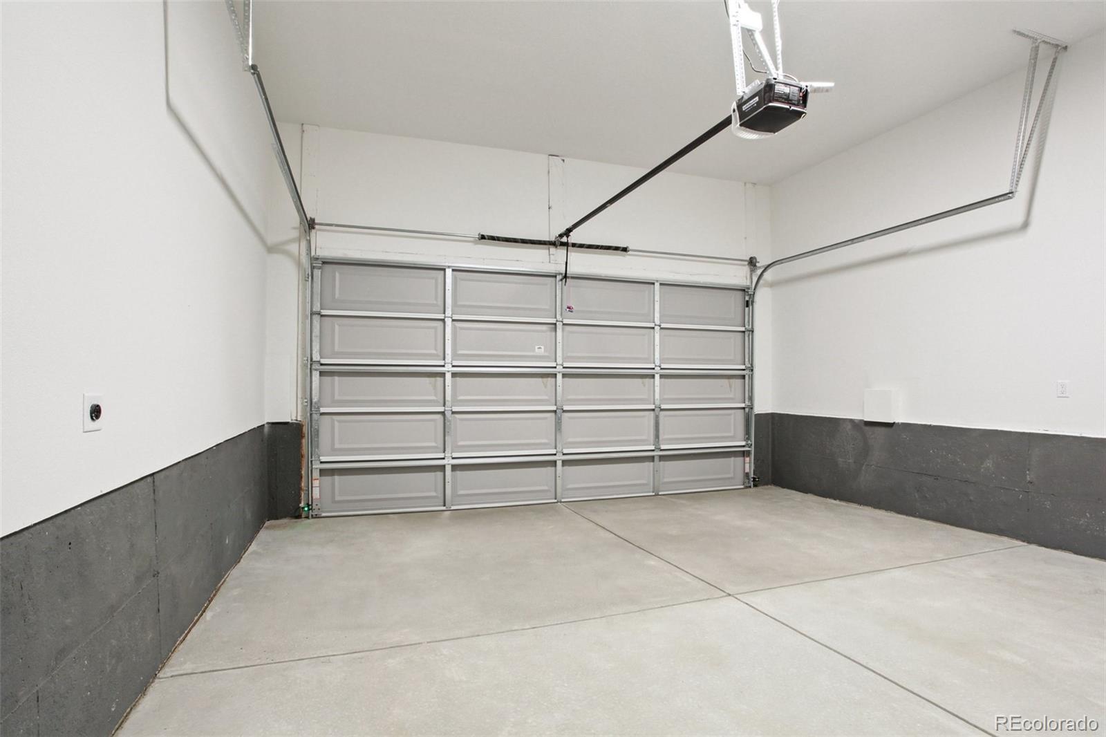 6441 Meade Way Arvada, CO 80003 - Photo 6 of 30 a view of an empty room with shelves