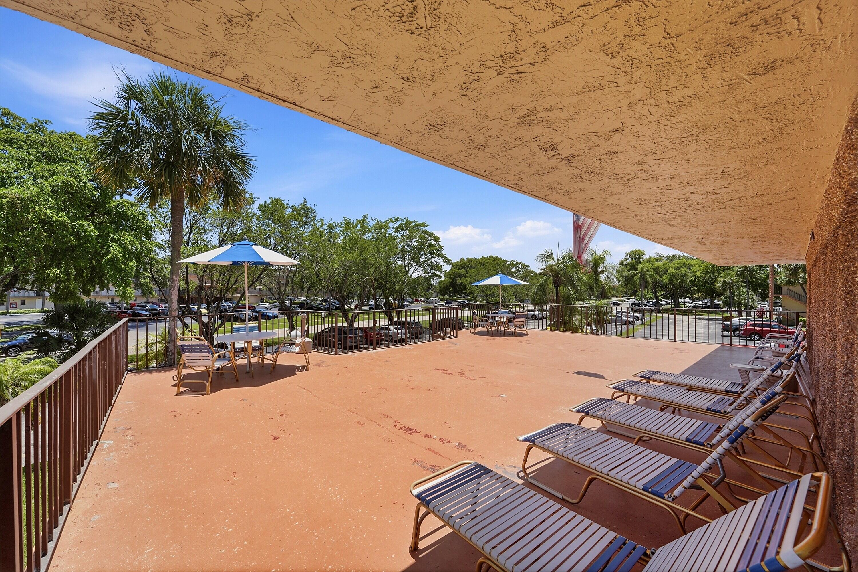 9273 Southwest 8th Street, Unit 321 Boca Raton, FL 33428 - Photo 23 of 29 Building Sun Deck